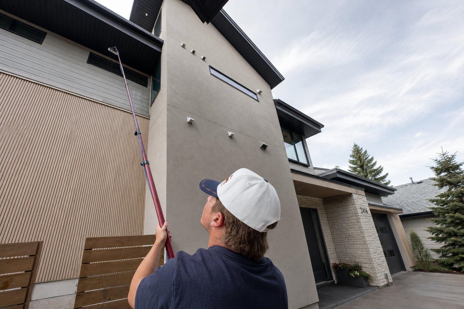 High-reach residential window cleaning in Calgary with a water-fed pole
